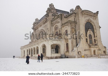 Casino building in Constanta, Romania,on the promenade waterfront at the Black Sea, in the middle of a big snowfall .