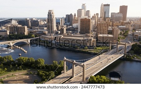 The late afternoon sun shines in this aerial view over the Minneapolis skyline
