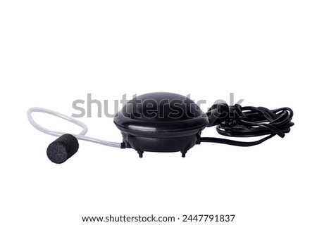 Air compressor with sprayer for aquarium isolated on white background.