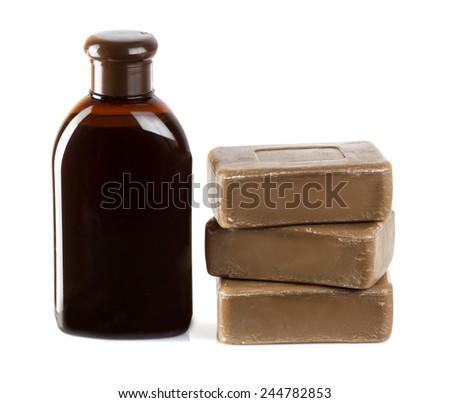 Birch coal tar soap and shampoo isolated on white Royalty-Free Stock Photo #244782853