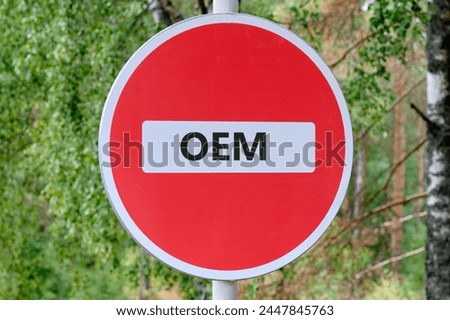 OEM original equipment manufacturer concept. Text traffic is prohibited on the sign against the background of the forest