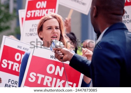 Workers Strike Demonstration In City. Labor Union March. Protest Rally Royalty-Free Stock Photo #2447873085
