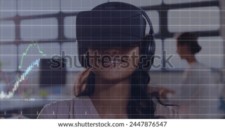 Image of financial data processing over business people using vr headsets. global business, connections, digital interface and technology concept digitally generated image.