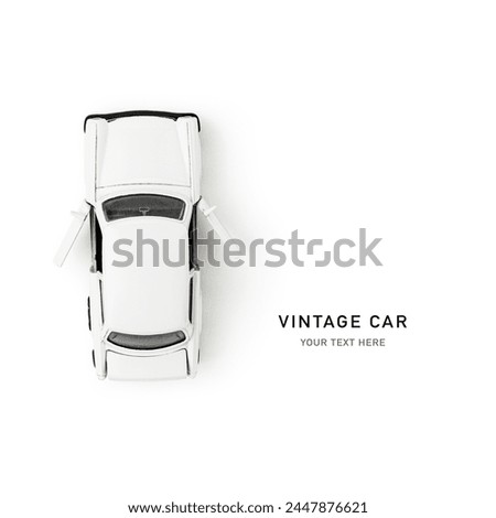 Vintage white retro car toy model isolated on a white background. Creative layout. Flat lay, top view. Nostalgia old things. Design element
