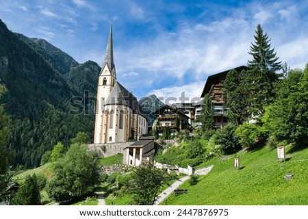 The picture shows a church in the town of Heiligenblut (Austria) on the Großglockner.