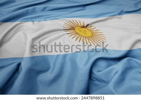 waving colorful national flag of argentina. macro shot