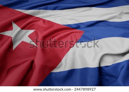 waving colorful national flag of cuba. macro shot