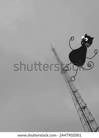 Trendy Collage dark Sky Tower silhouette photo and black Cat illustration. Technology artwork can used social media poster, notebook print cover. Vertical photo.