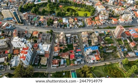 La Paz, Bolivia, aerial view flying over the dense, urban cityscape. San Miguel, southern distric. South America Royalty-Free Stock Photo #2447914979