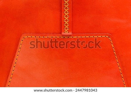 Women's red leather bag on a wooden floor, photo for an e-commerce store catalog a social network.