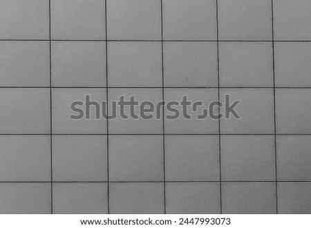 Contemporary Facade Design. Square Pattern in Modern Building Wall. Abstract canvas, background. Monochrome detail.