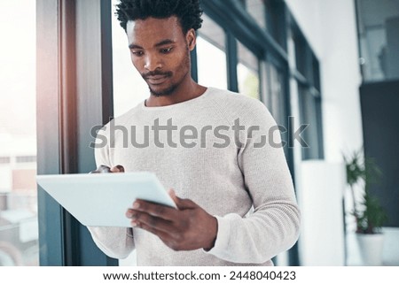 African man, tablet and office for career, online information and digital project for internet research. Creative male editor or professional person with checklist on tech for web proposal for job