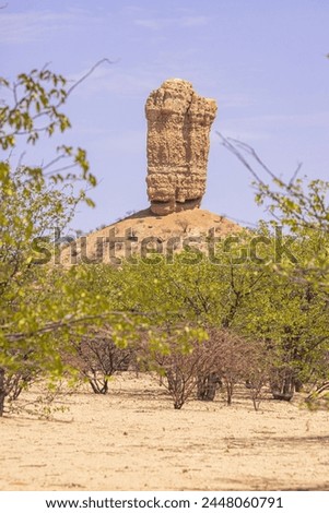Picture of the famous Vingerklip rock needle in northern Namibia during the day in summer