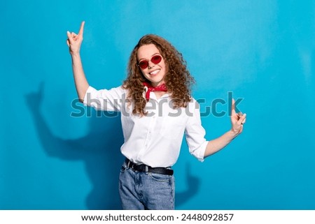 Photo portrait of nice young lady dance discotheque sunglass summer vacation wear trendy white garment isolated on blue color background