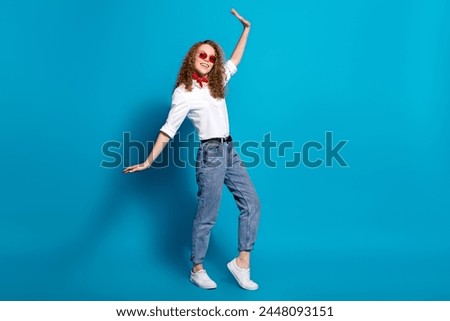 Photo portrait of nice young lady dance discotheque sunglass summer vacation wear trendy white garment isolated on blue color background