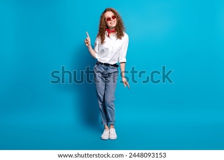 Photo portrait of nice young lady dancing have fun sunglass summer vacation wear trendy white garment isolated on blue color background
