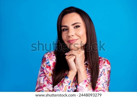 Photo of shiny adorable lady dressed print blouse arms chin smiling isolated blue color background Royalty-Free Stock Photo #2448093279