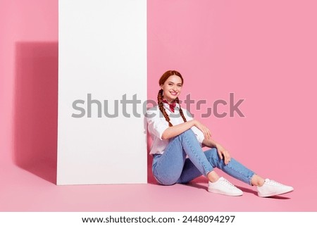 Full length photo of cheerful cool lady dressed cowboy outfit communicating modern device empty space isolated pink color background
