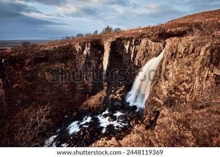 Slow Shutter Shot Scenery Of Waterfall