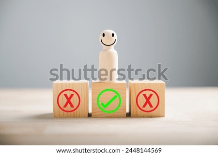 Wooden cube block displays people examining right and wrong considering yes or no. True or false symbols represent business options. Decision-making concept on wood. Think With Yes Or No Choice.