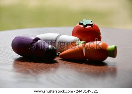 vegetable wooden toys placed on the windowsill
