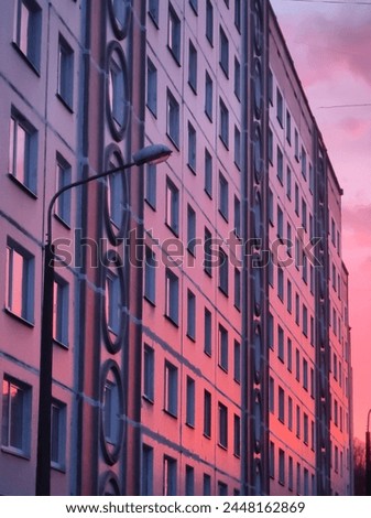 Multi-storey, multi-apartment residential building. Soviet period built in the seventies - eighties of the twentieth century. Royalty-Free Stock Photo #2448162869