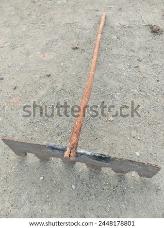 Photo of traditional rice rake tool