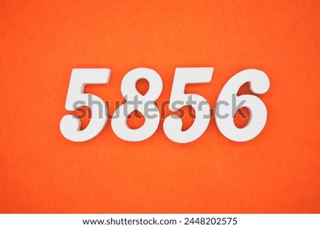 Orange felt is the background. The numbers 5856 are made from white painted wood.