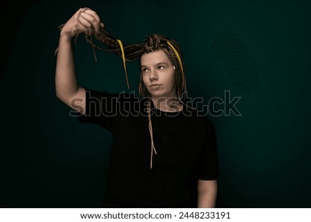 Woman With Braids Holding Scissors