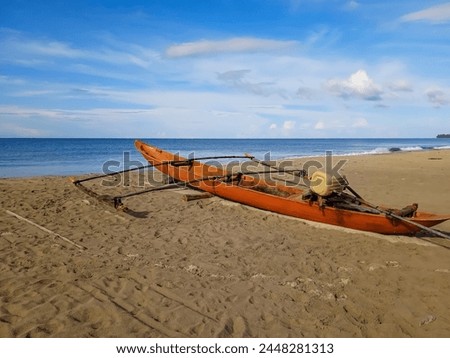 Wooden boat used for fishing at sea.