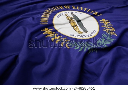 big waving colorful national flag of kentucky state. macro shot
