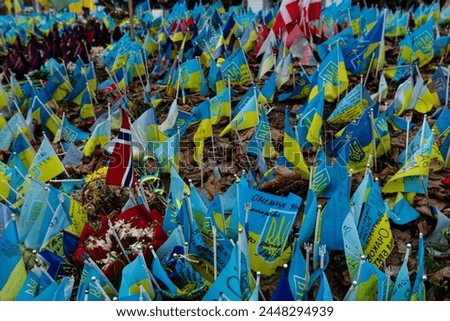 A memorial to the fallen soldiers in Ukraine 2024. Flags on Independence Square in Kiev. Heavenly Hundred. Many dead soldiers.  Royalty-Free Stock Photo #2448294939
