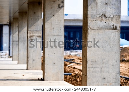 Solid cement pillars for house construction Royalty-Free Stock Photo #2448305179