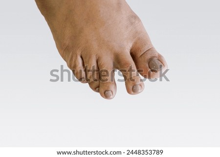 Foot finger body thai woman color paint on isolated background.