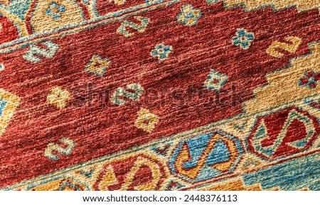 Colorful oriental silk carpet pattern, close up photo