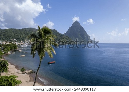 Aerial  of Gros Piton and Petit Piton on St. Lucia from Soufriere Beach.  Shot on a drone in the Caribbean on beautiful Saint Lucia island.