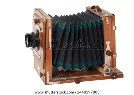 Old vintage black camera isolated on white background with cliping path.