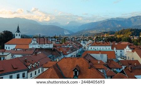 Mountains and Red Roofs of Kamnik Town under the Kamnik-Savinja Alps, Slovenia Royalty-Free Stock Photo #2448405693