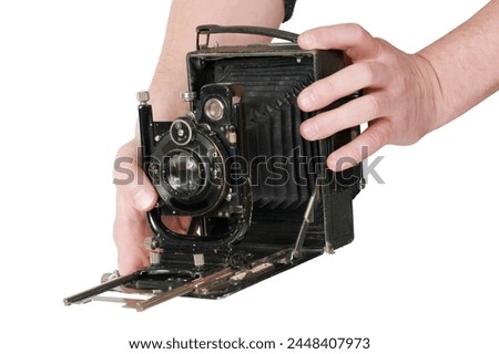 Old vintage black camera isolated on white background with cliping path.