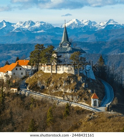 Pilgrimage site Sveta gora in Zasavje with Kamnik-Savinja Alps in background, Slovenia Royalty-Free Stock Photo #2448431161