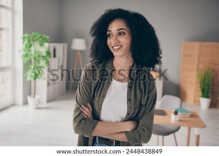 Photo of positive confident lady secretary dressed shirt arms folded indoors workshop workplace workstation
