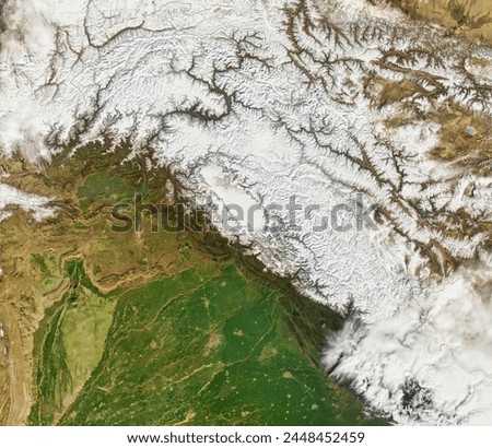 Snow in the Hindu Kush. . Elements of this image furnished by NASA.