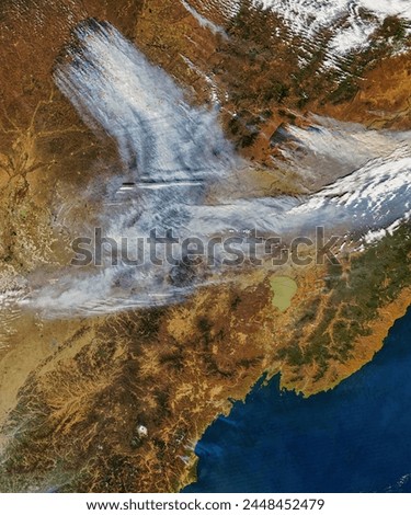 Fires and smoke across Northern China. Fires and smoke across Northern China. Elements of this image furnished by NASA.