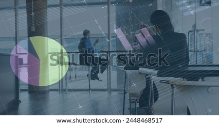 Image of financial data processing over diverse group of business people in office. global business, finances and digital interface concept digitally generated image.