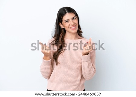Young Italian woman isolated on white background making money gesture