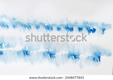 patterned blue gradient fluid lines on paper with texture  Royalty-Free Stock Photo #2448477843