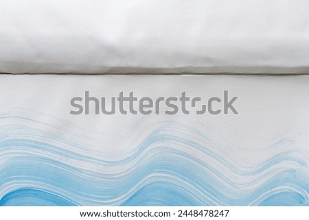 patterned blue gradient fluid lines on paper with texture  Royalty-Free Stock Photo #2448478247