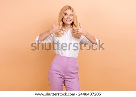 Photo of optimistic blonde hair curly mature age woman senior hiring manager double thumbs up applicant isolated on beige color background