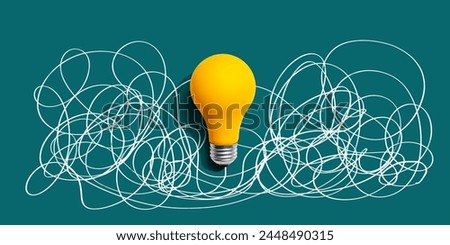 Clarifying complex ideas theme with light bulb - Flat lay Royalty-Free Stock Photo #2448490315