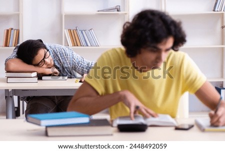 Two male students in the classroom Royalty-Free Stock Photo #2448492059